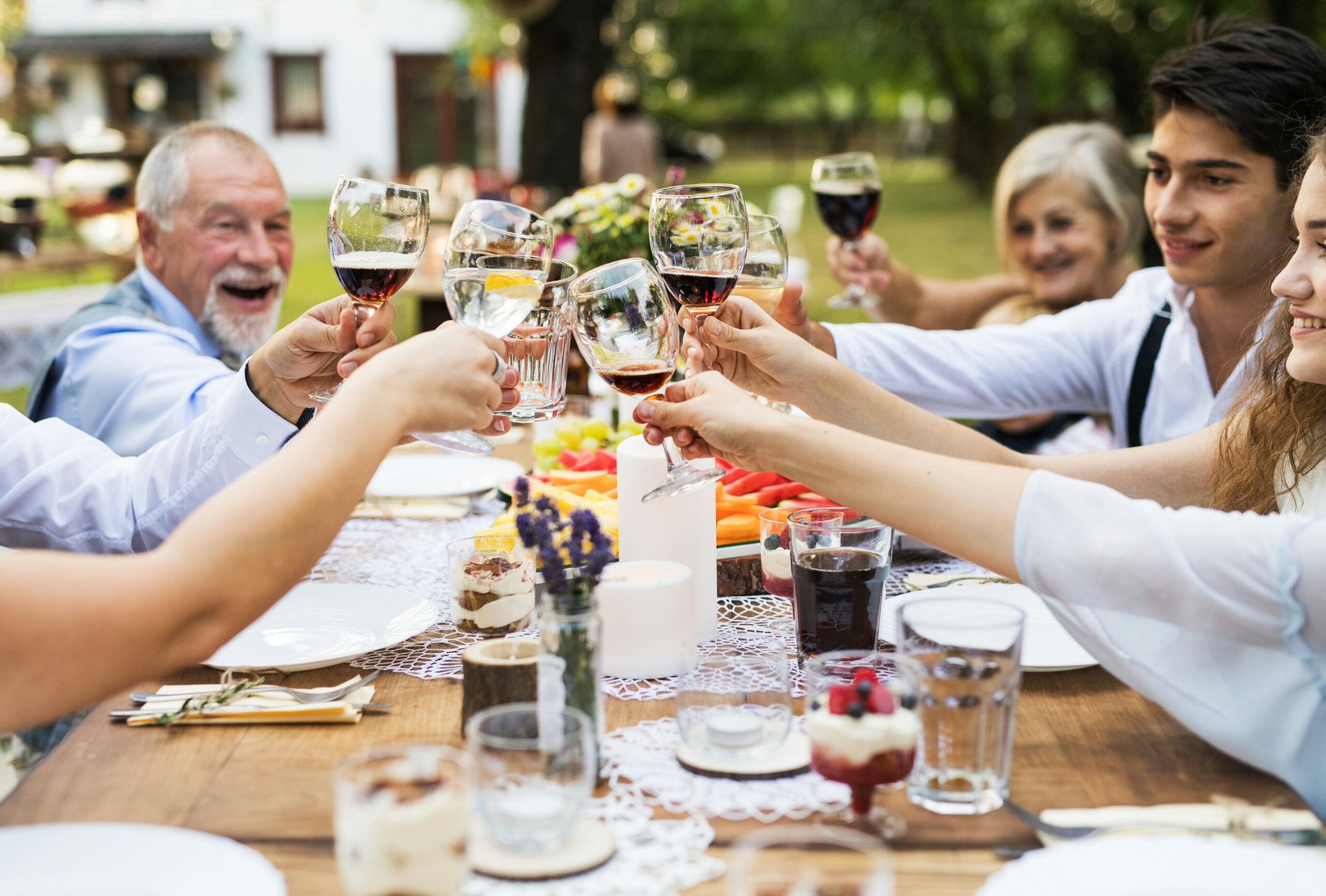 People toast across a banquet table