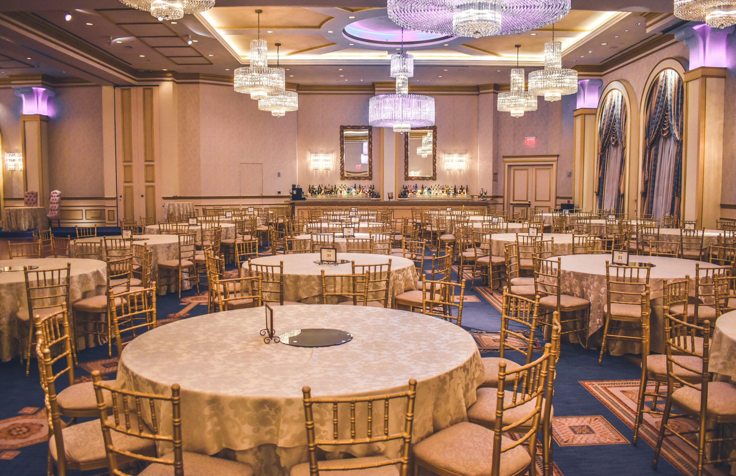 formal gala tables in a hotel banquet room.